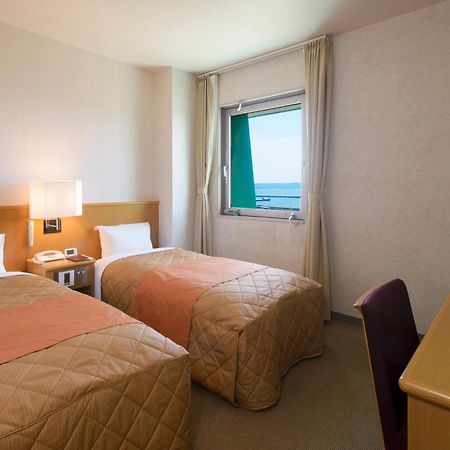 Hotel Folkloro Ominato Mutsu Rum bild